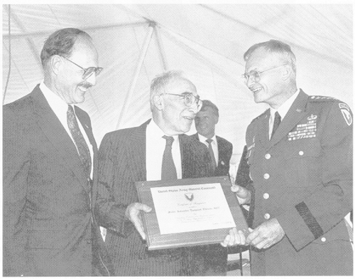 Pictured left to right: GTE Government Systems President Francis A. Gicca; Vice President and General Manager Bernard Resnick; and U.S. Army General William G.T. Tuttle, Jr., Commander, Army Materiel Command