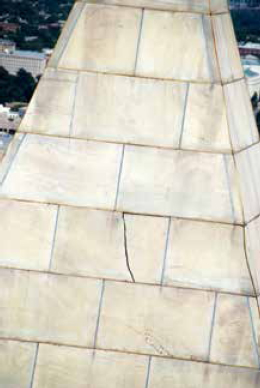 A photo taken from a helicopter shows cracks at the top of the monument