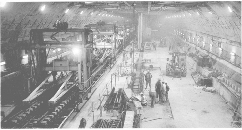 The machine which embeds the tracks and sleeper blocks into concrete