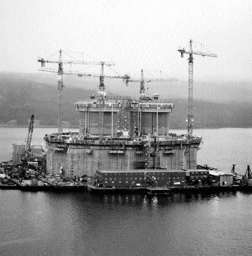 Construction of the Gravity Base Structure in the Deep Water Site at Bull Arm. The shafts are now at a height of 106.2 meters