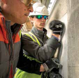 Workers put a repair in place