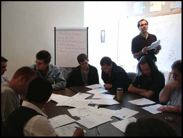 The whole team comes together to estimate. The project manager reads the story cards aloud and the team quickly moves through estimating. When a pair stops for too long talking through a problem, the first question asked is, “Does it affect your estimate?” If not, the pair is encouraged to choose and estimate and then the team moves on
