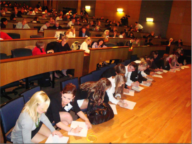 Puget Sound chapter of PMI pre-dinner continuing education session (PDUs) on the use of mind mapping software. The North Kitsap High School students are in the foreground participating in the mind mapping training. During the dinner that followed each student was paired with a PMP mentor