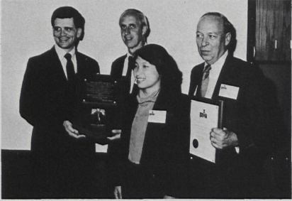 Philadelphia, Pa, June 2, 1988- (L. To R.) DVC-PMI President Jim Kane Presents Wesley F. Mikes, Senior Vice President Of O'Brien-Kreitzberg & Associates, Inc. (OKA) The Project Team Of The Year Award. Joining Them Is DVC-PMI Committee Chairperson Kristy Tan And Jim O'Brien OKA Chief Executive Officer
